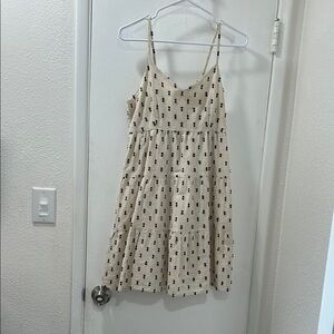 Cream Sleeveless Dress with Black Pattern